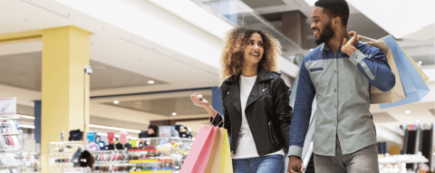 Couple going on shopping spree after getting their Keesler Visa credit card rewards